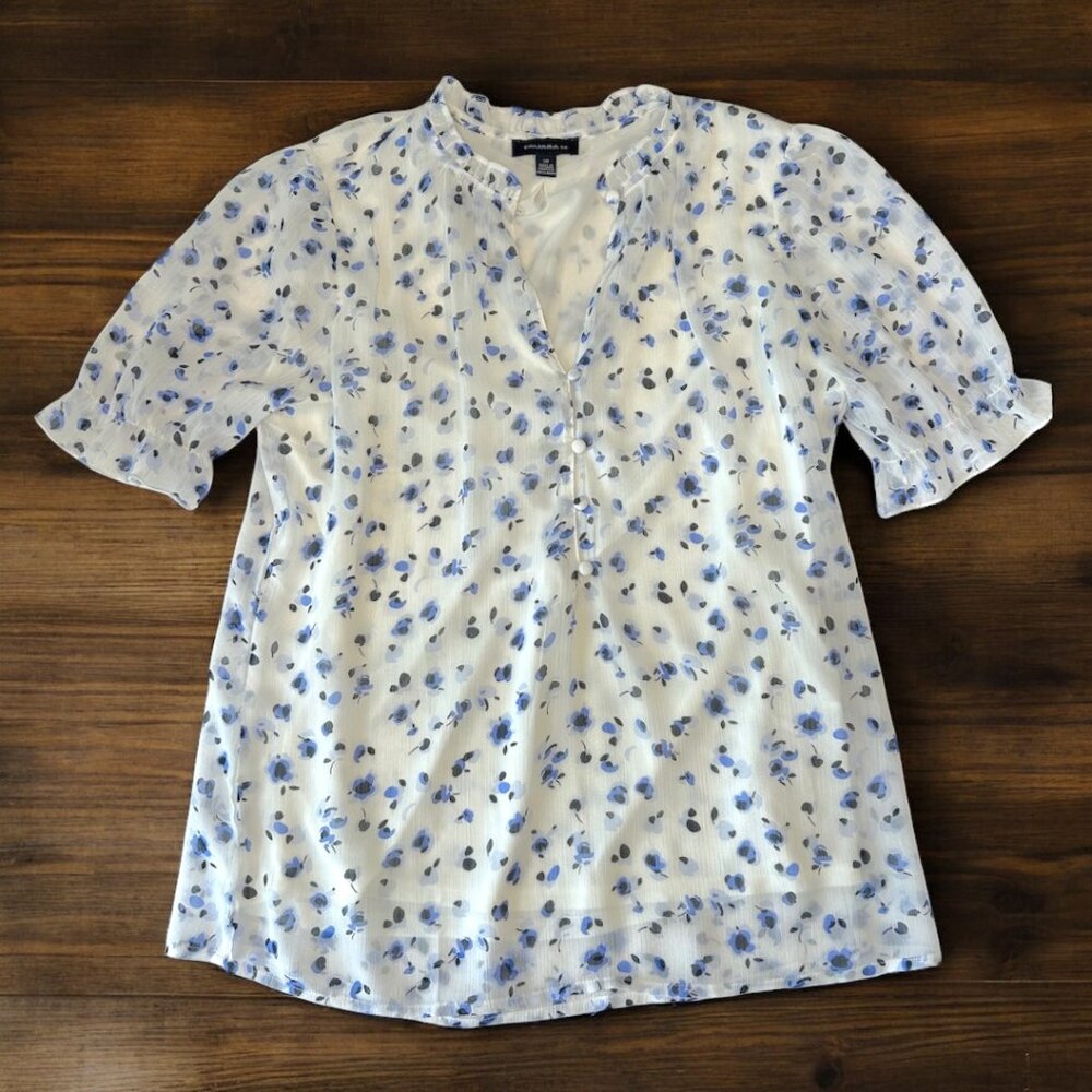 Tamara H. white blouse w/blue flowers